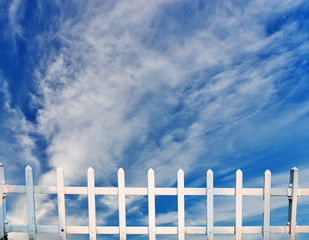 Wood fence against blue sky