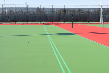 Before painting lines on a tennis court