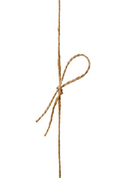 Closeup string or twine tied in a bow isolated on white background