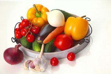 Fresh autumn vegetables on a white background