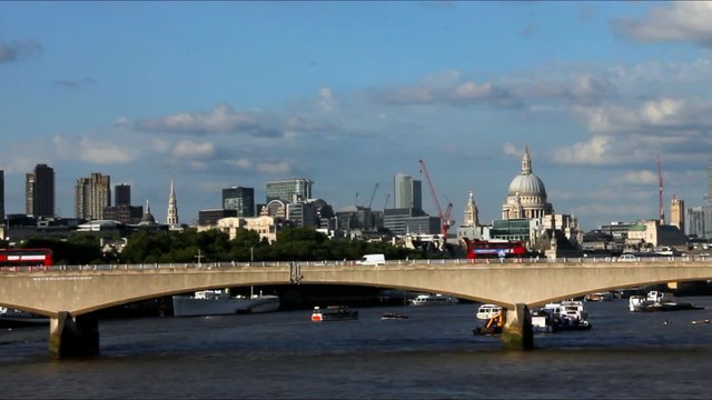 City of London in late afternoon light from Hungerford Bridge. This view includes Waterloo Bridge.