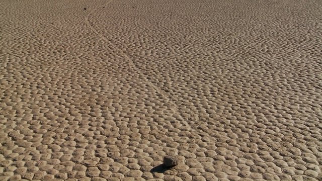 The mysterious rocks which race across the dry lakebed known as the Racetrack in Death Valley.