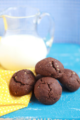 Italian chocolate cookies with walnuts and a cup of coffee 