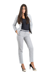 Cute gorgeous confident business woman with hands in pockets 