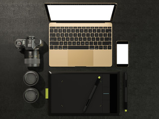 Fototapeta na wymiar Designer accessories and gadgets on black leather background