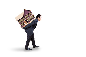 Real estate business with worker carries house