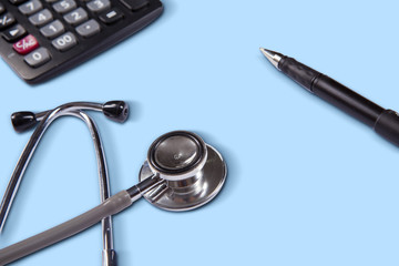 Stethoscope with pen and calculator