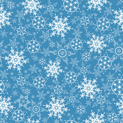 Festive seamless pattern with ornate snowflakes