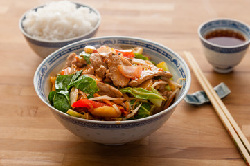 Stir fry pork with vegetables and chilli sauce.