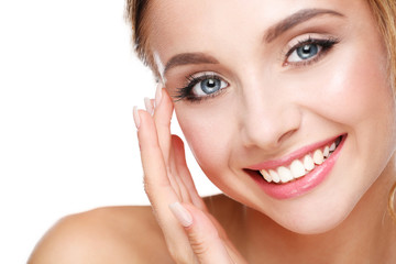 Studio shot of a beautiful young woman with perfect skin against