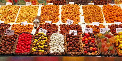 Various chocolates, sweets and snacks for sale at La Rambla - Barcelona. This market is a popular tourist destination in the Spanish city.