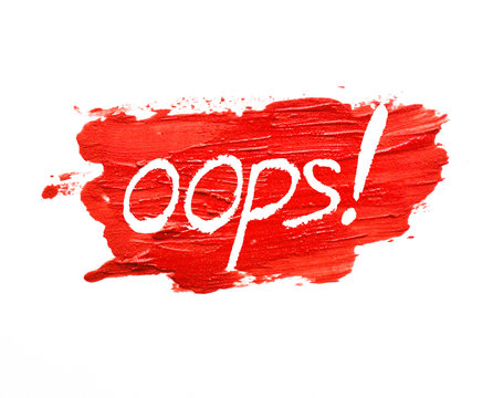 red lipstick stroke on white background with "oops"