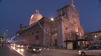 Christmas decorations around an Italian church square.