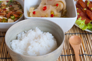 Soft boil rice with other food in Thai style