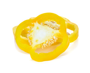 yellow pepper slices on white background