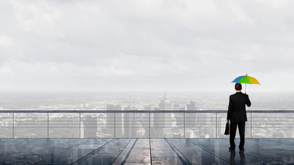 Businessman with umbrella