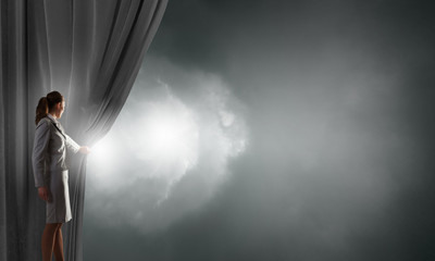 Obraz premium Woman open curtain