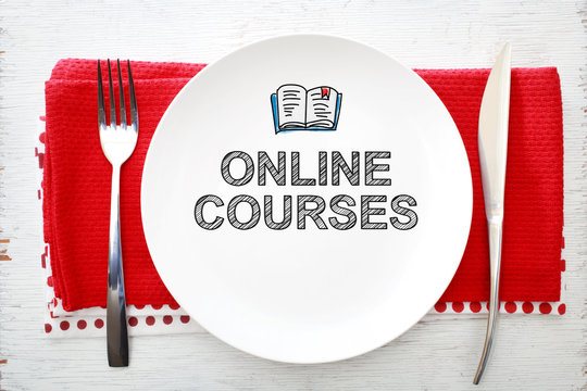 Online Courses concept on white plate