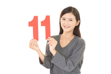 数字の11を持つ女性