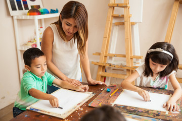 Pretty girl teaching art class