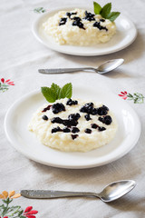 rice pudding with blueberry cream