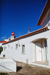 Fototapeta na wymiar house of white stone lighthouse