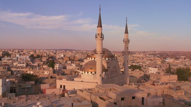 A mosque towers above the Arab city of Madaba in Jordan.
