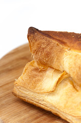 Close view of pastry from bakery on the wooden board