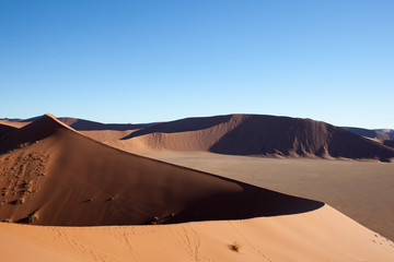 Naklejka na ściany i meble Dune rosse nel deserto della Namibia