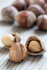 hazelnuts on wooden background