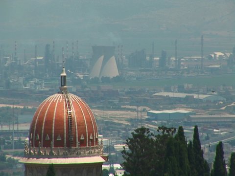 Power plants and the Baha'i temple dome are seen on the skyline of Haifa, Israel.