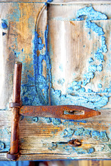   in africa the old wood  facade home and safe padlock