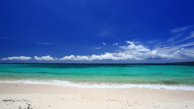 Tropical sea beach with  turquoise water and white sand
