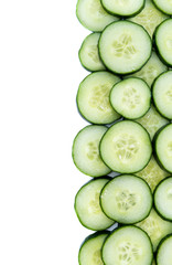 Cucumbers over white