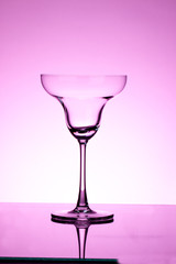 Empty wine glass. isolated on pink background