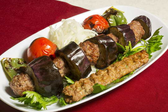 Turkish spicy meatballs with grilled vegetables