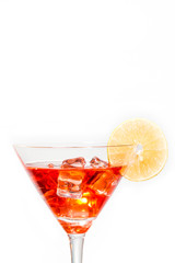 red cocktail with lemon on white background