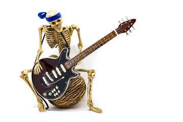 Model skeleton playing electric guitar