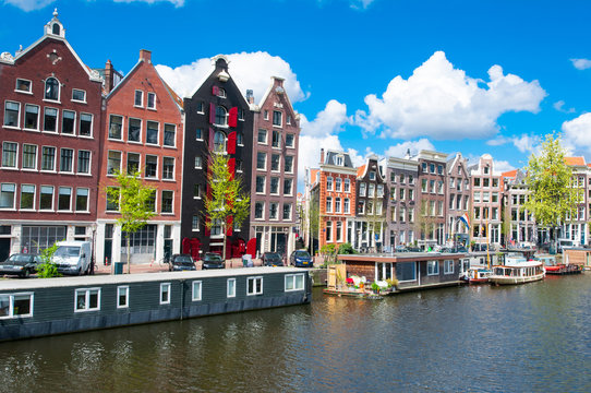 Traditional Amsterdam cityscape with apartment houses in down town. Netherlands.