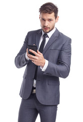 Cool businessman talking on mobile phone