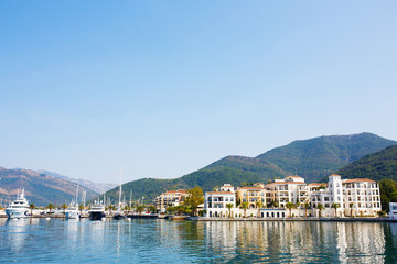 Fototapeta na wymiar View of the Porto Montenegro, a luxury yacht marina in Montenegro, Adriatic Sea.