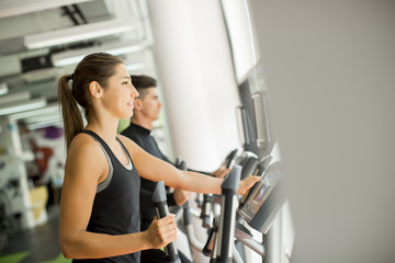Fototapeta premium Young people training in the gym