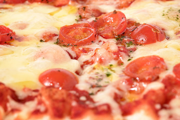 pizza mozzarella and cherry tomatoes