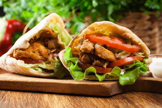 Doner kebab - fried chicken meat with vegetables