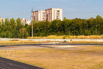 Fototapeta na wymiar Abandoned football field at lviv. top view