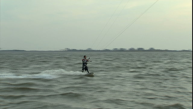 MCU follow kite board jump through low sun 