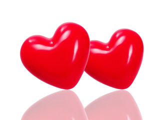 Red hearts on light background