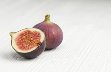 figs on white wooden background