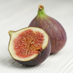 figs on white wooden background