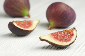 figs on white wooden background